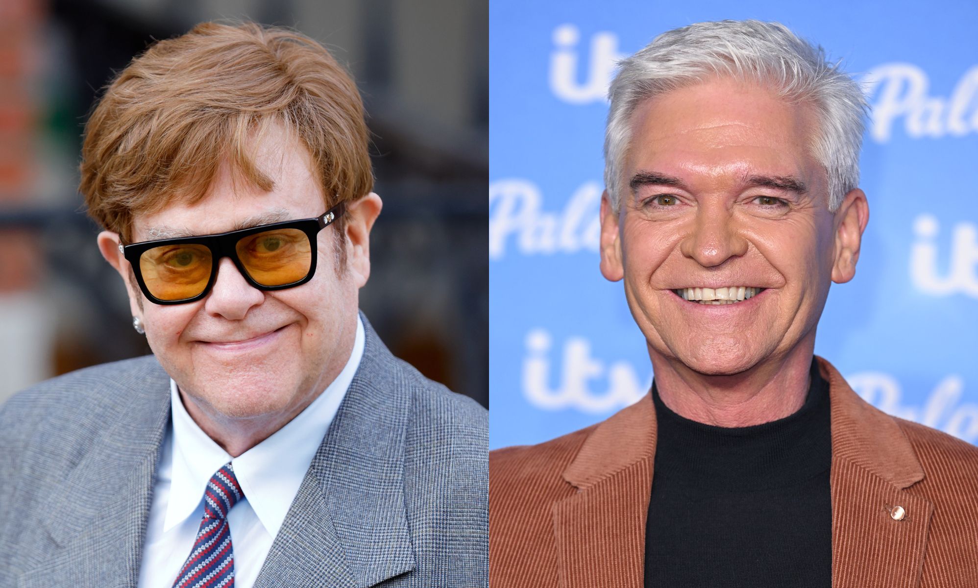 On the left, Elton John in black and yellow glasses, a grey suit, white shirt and blue and purple tie. On the right, Phillip Schofield in a black t-shirt and brown jacket. Both are smiling at the camera.