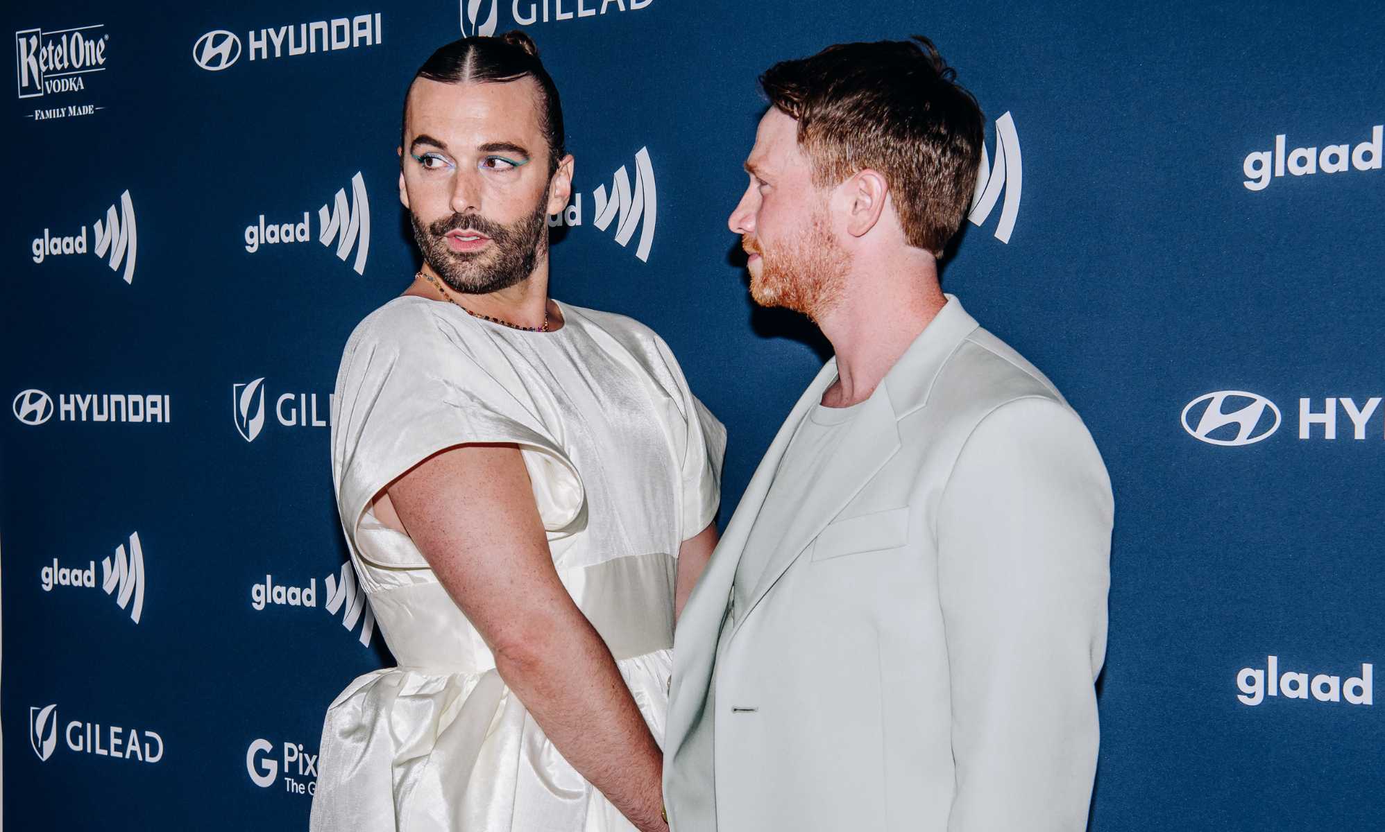 Jonathan Van Ness (L) and husband Mark Peacock (R)
