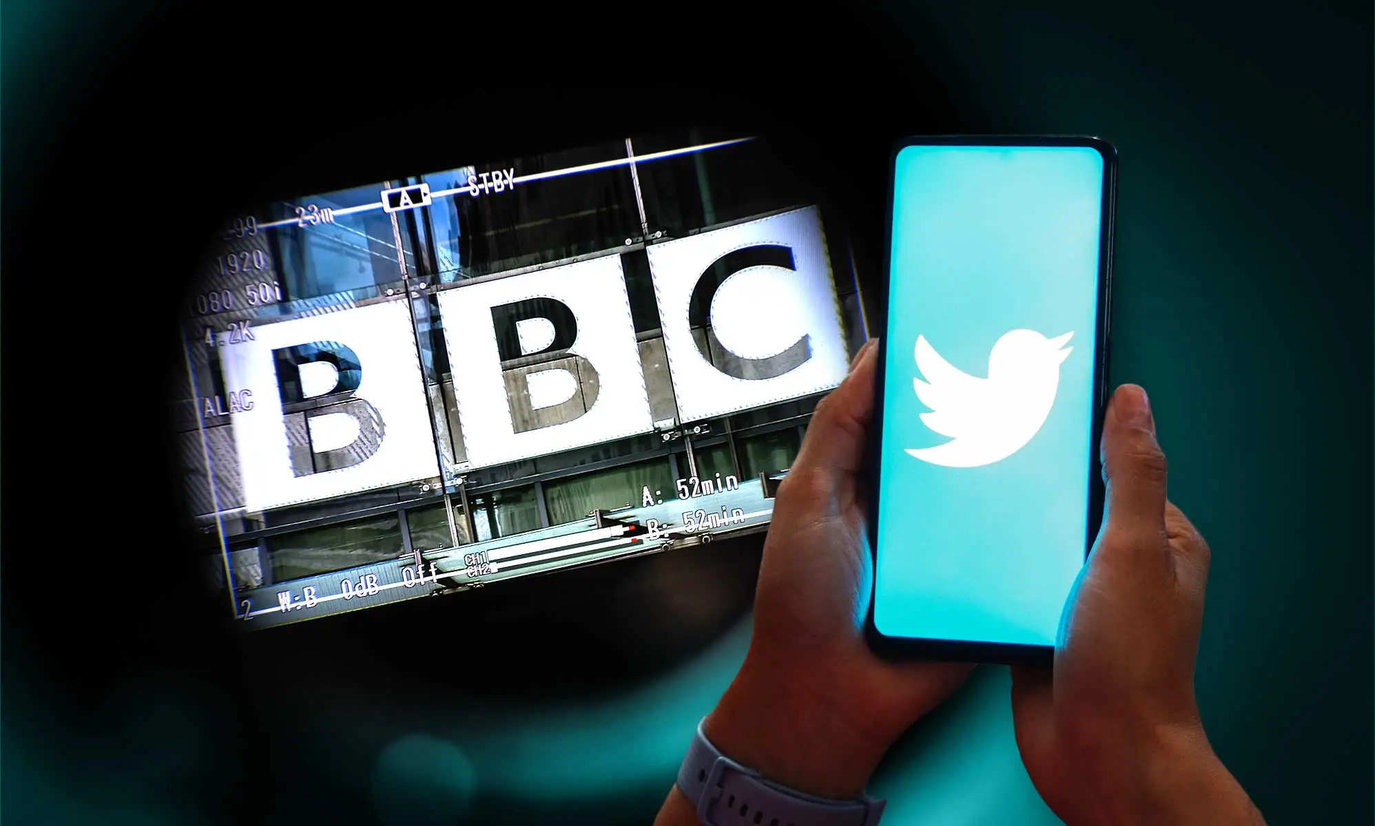 The BBC logo and a phone with a TWitter logo