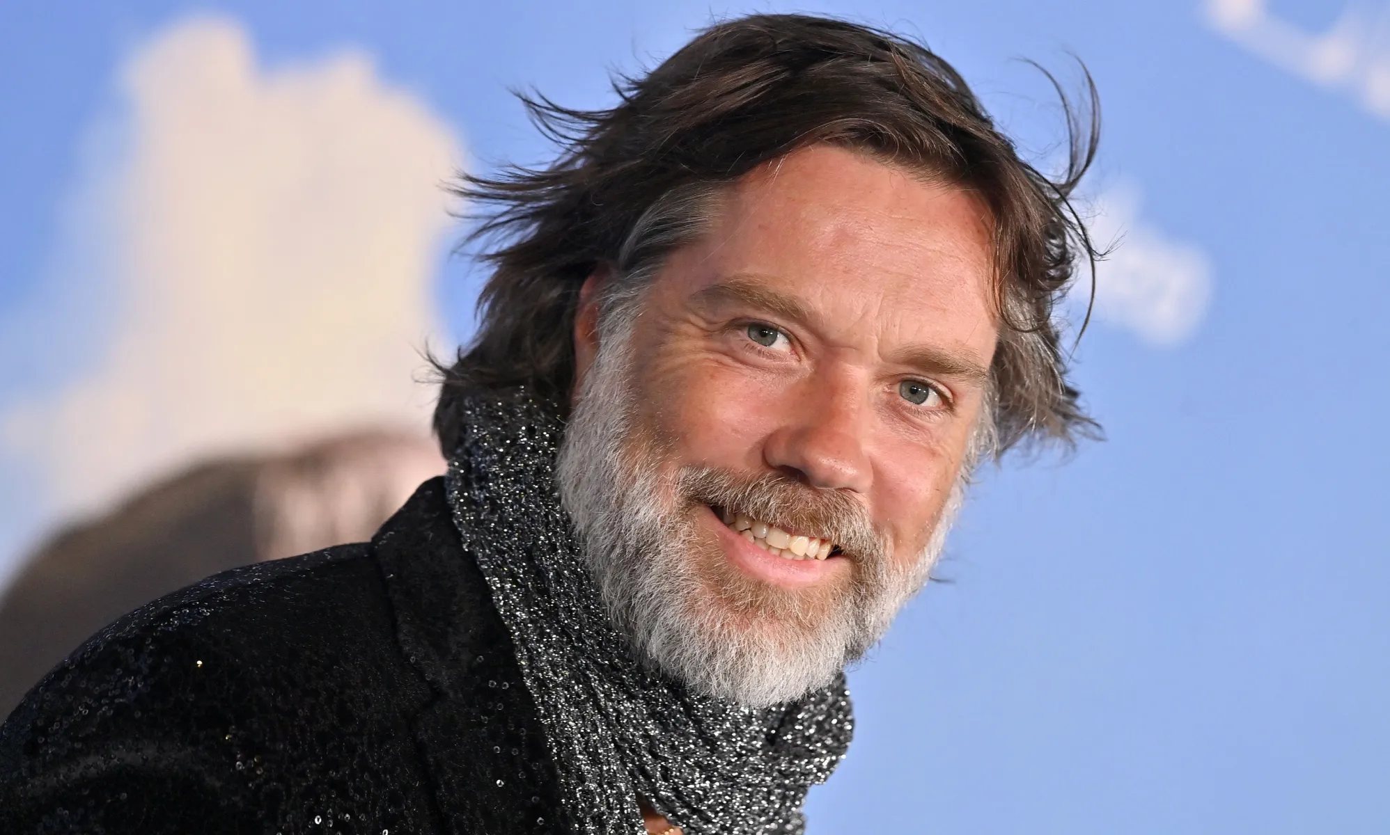 Rufus Wainwright stands with trans friends amidst rights anti-LGBTQ+ hate.