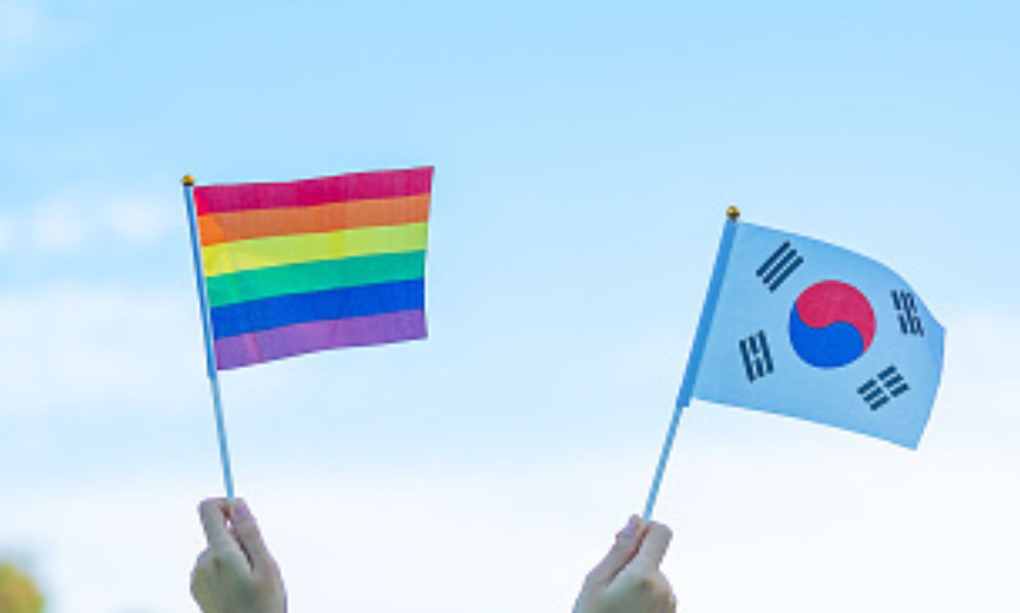 Pride flag and South Korean flag.