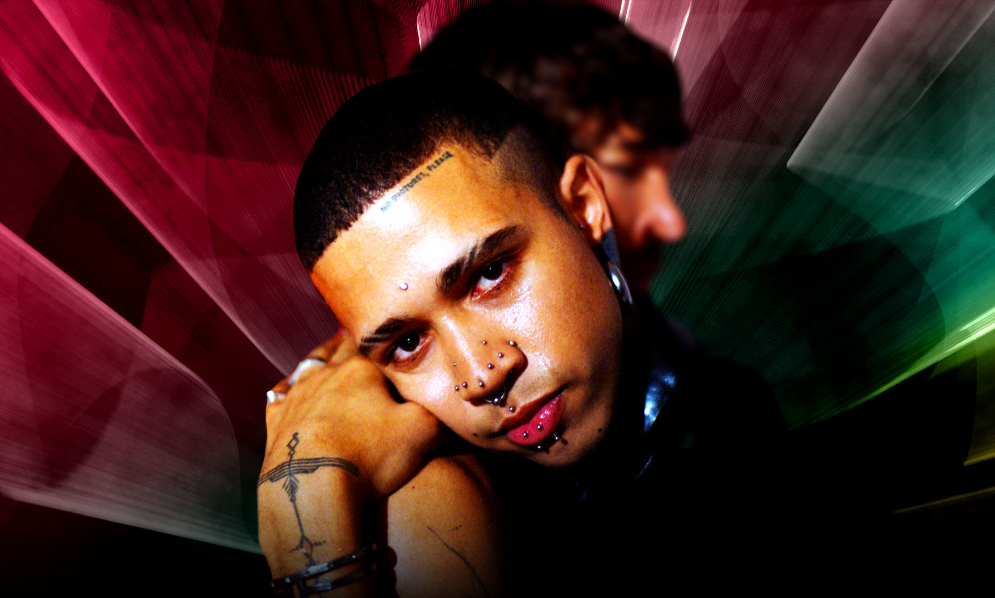 Queer poet, model and author Kaiden Ford embracing another figure