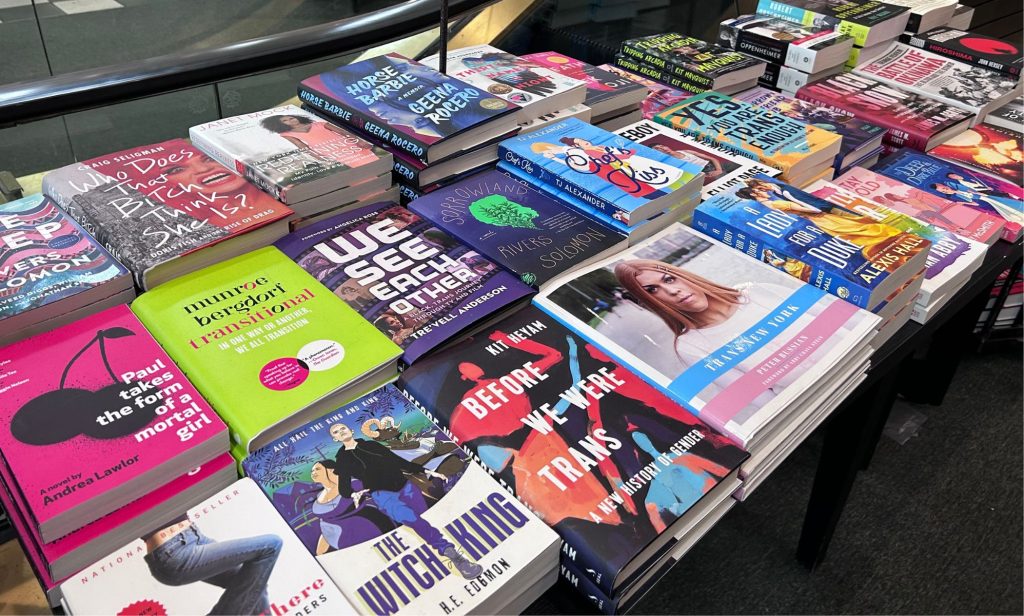 A pile of LGBTQ+ books in Barnes & Noble
