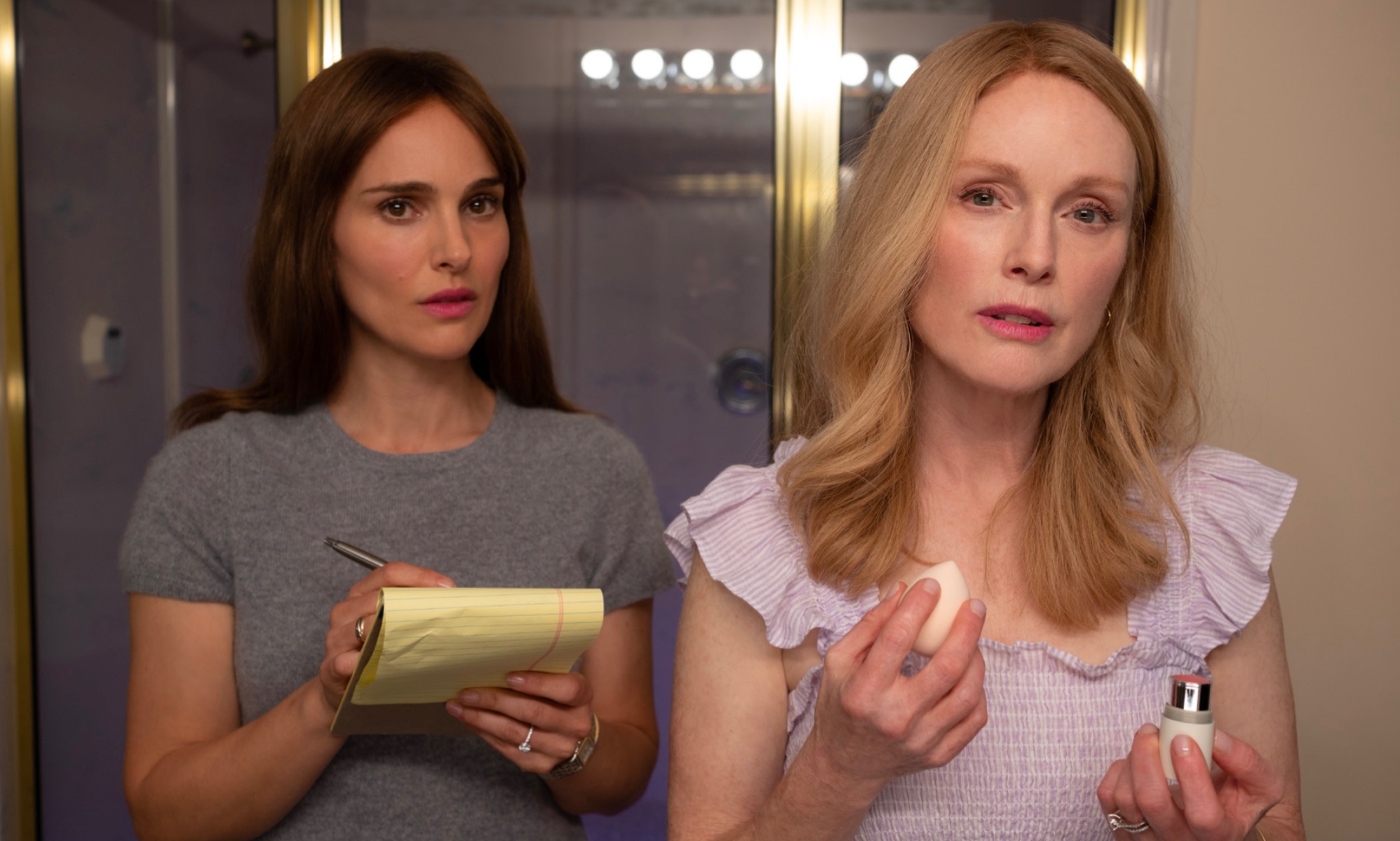 Natalie Portman (L) and Julianne Moore (R) star in May December.