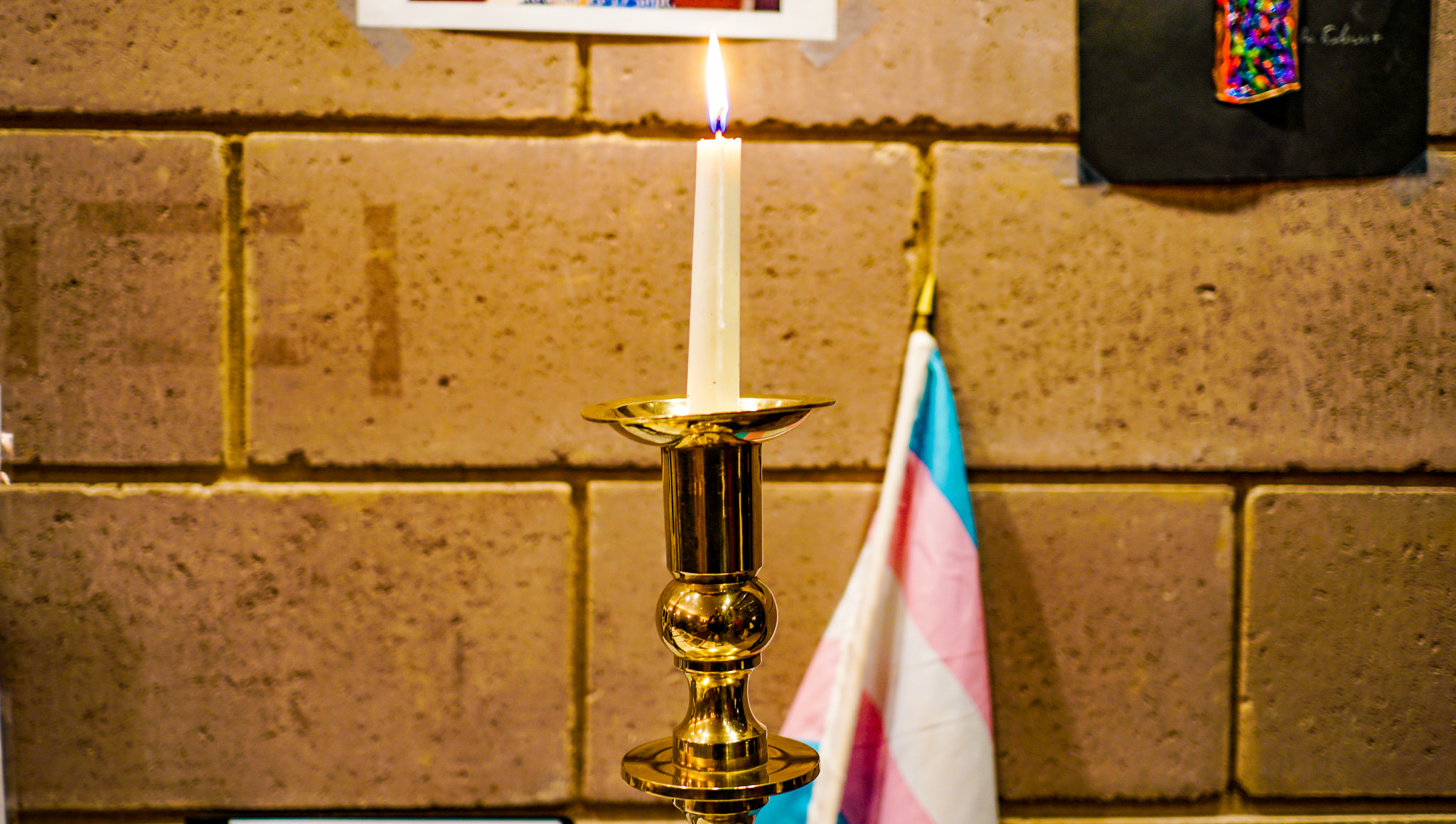 A candle mourns transgender victims of violence like Tydie, who was killed in Baltimore.