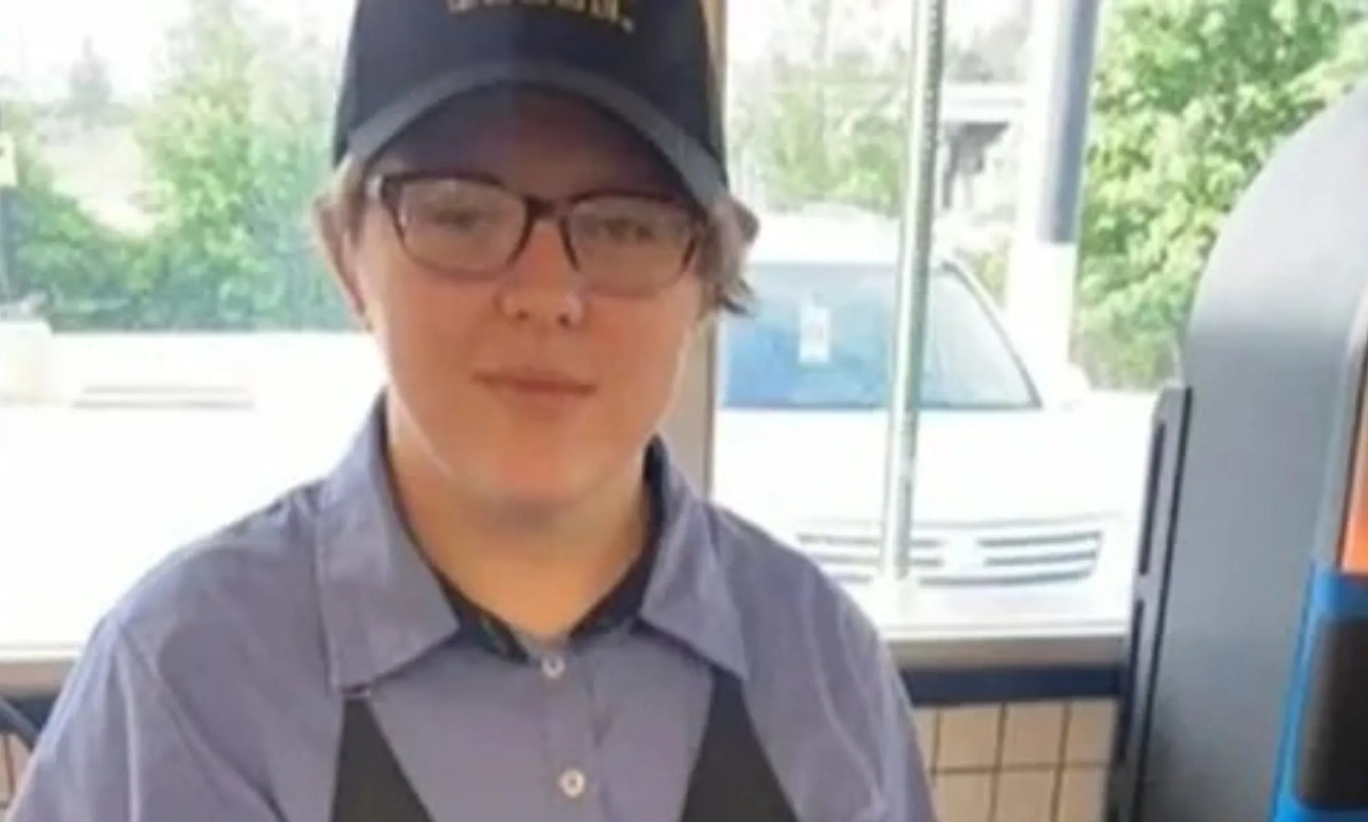 18-year-old Jacob Williamson dressed in his work uniform.