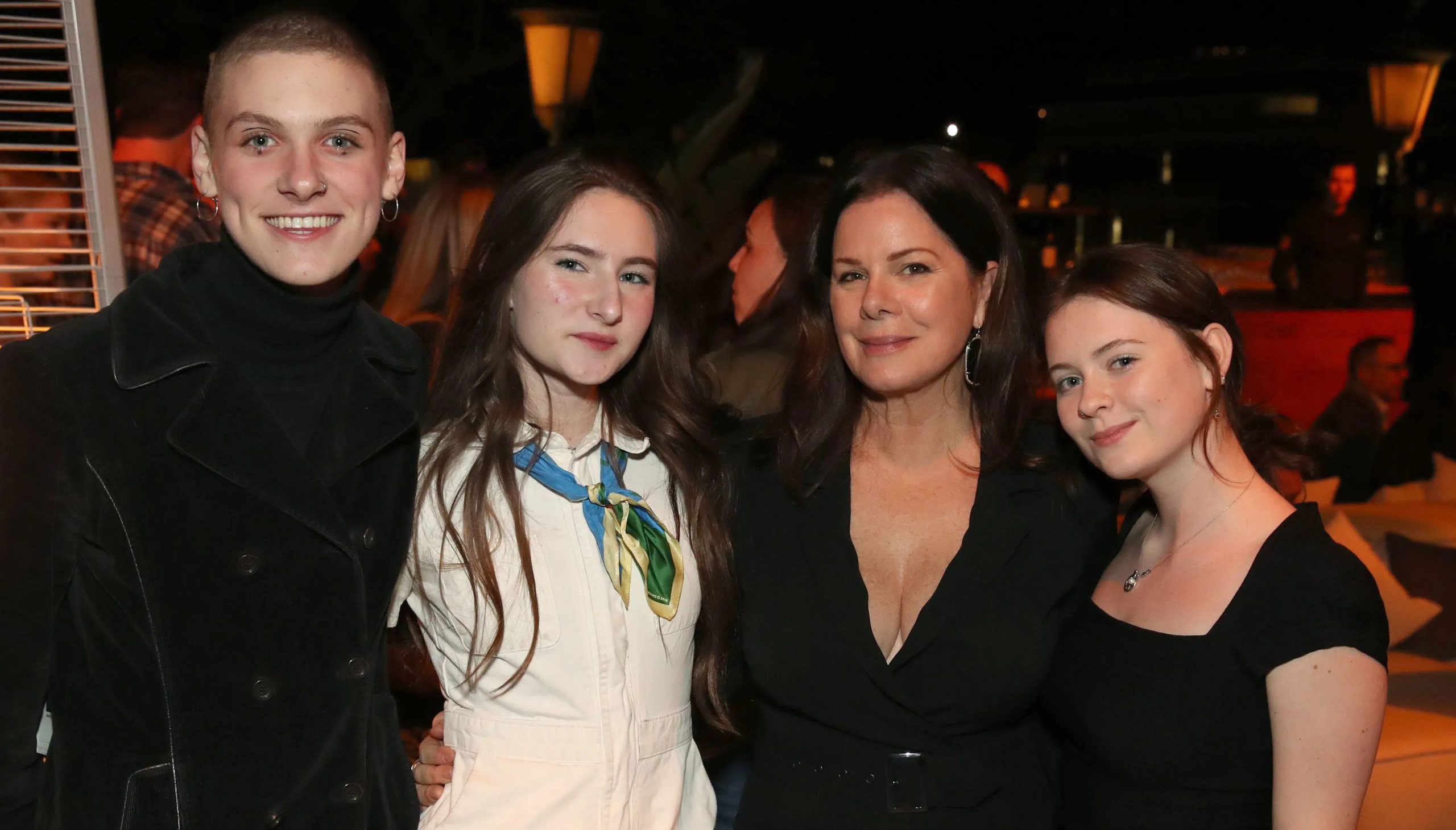 WESTWOOD, CALIFORNIA - FEBRUARY 26: Marcia Gay Harden (2nd from right) and family attend National Geographic