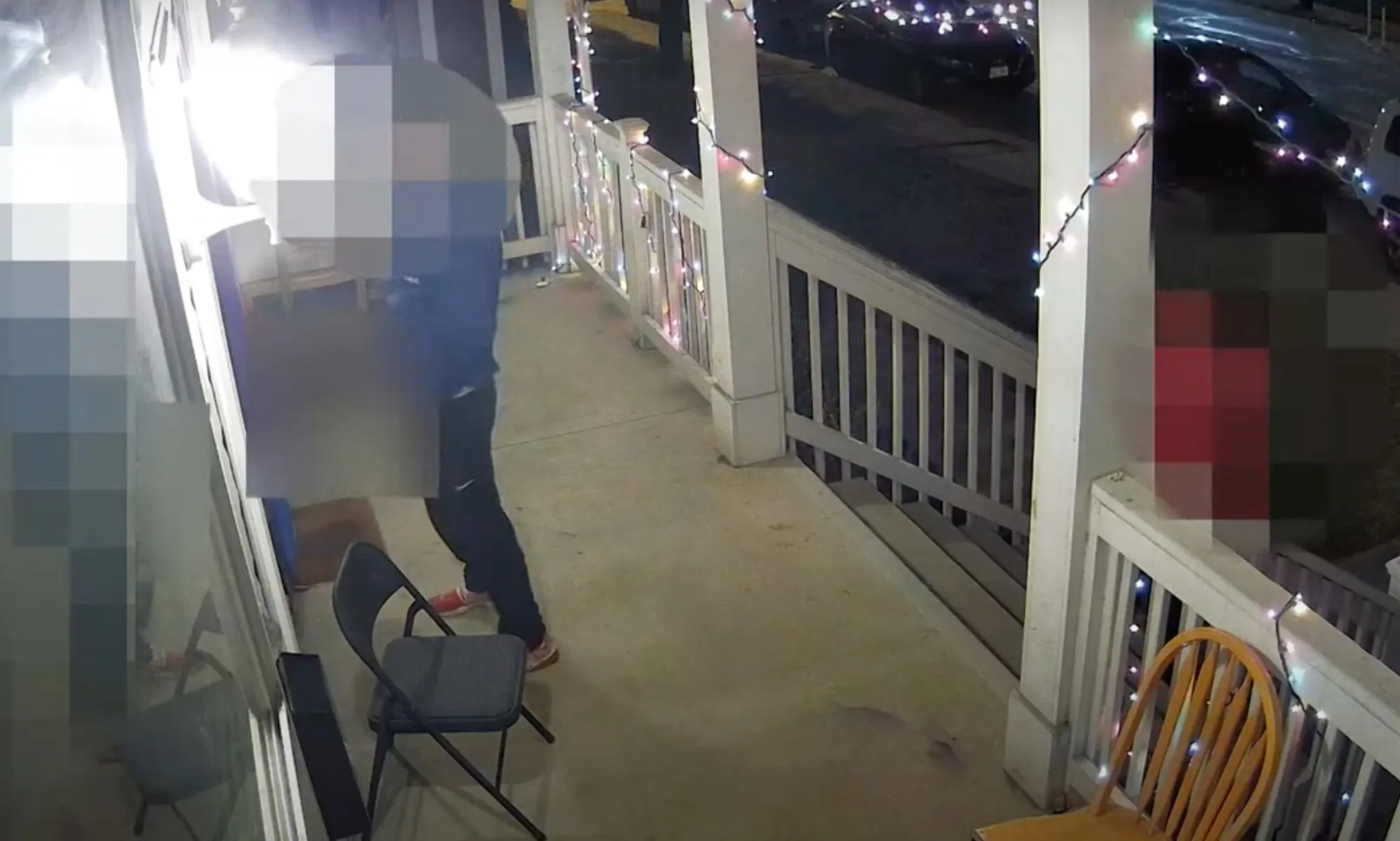 An Ohio man, who has been blurred out, is captured on surveillance video as he pees on an LGBTQ+ Pride flag outside a home
