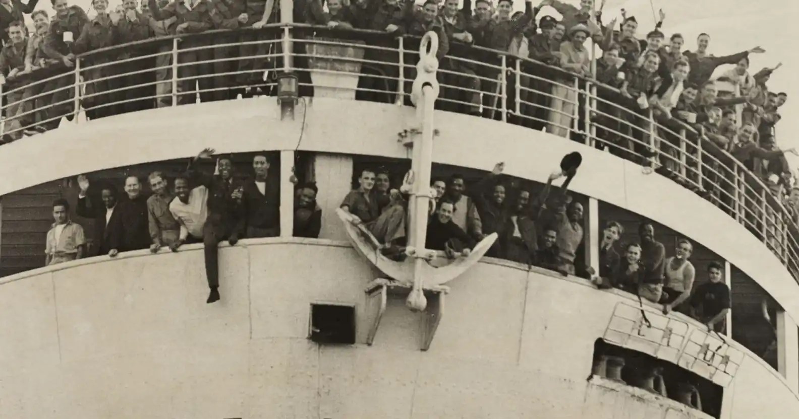 Image shows crowds about the HMT Empire Windrush