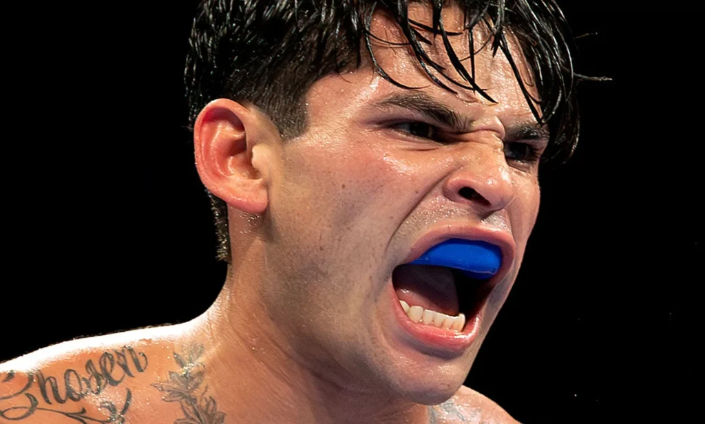 Ryan Garcia, with a gum shield, screaming.