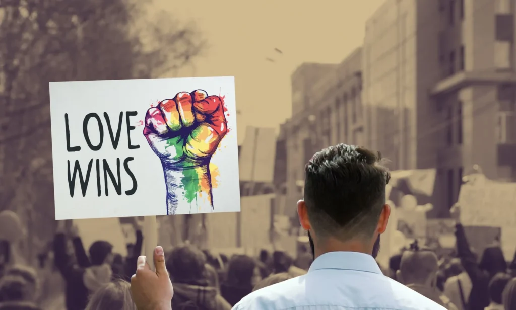 This is an image of someone holding a protest sign that reads
