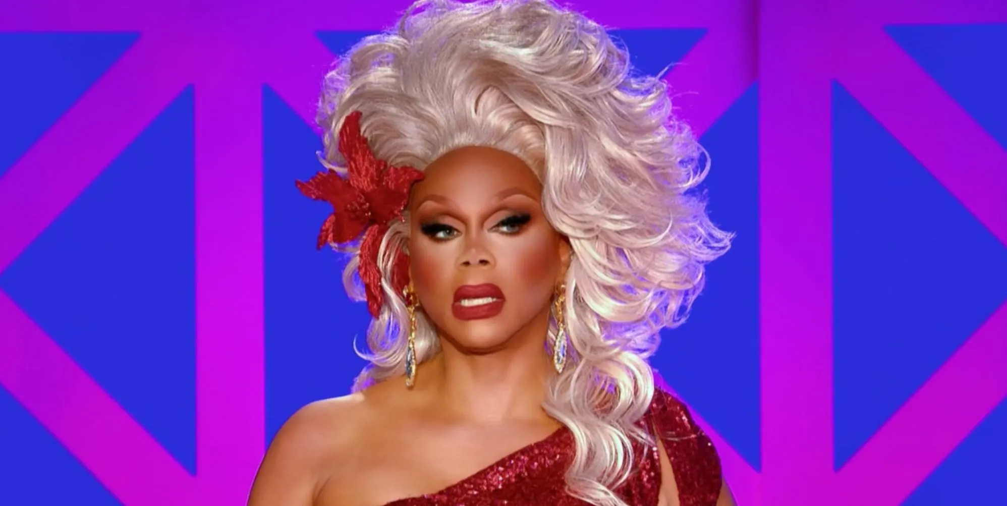 RuPaul at the judges table on drag race uk