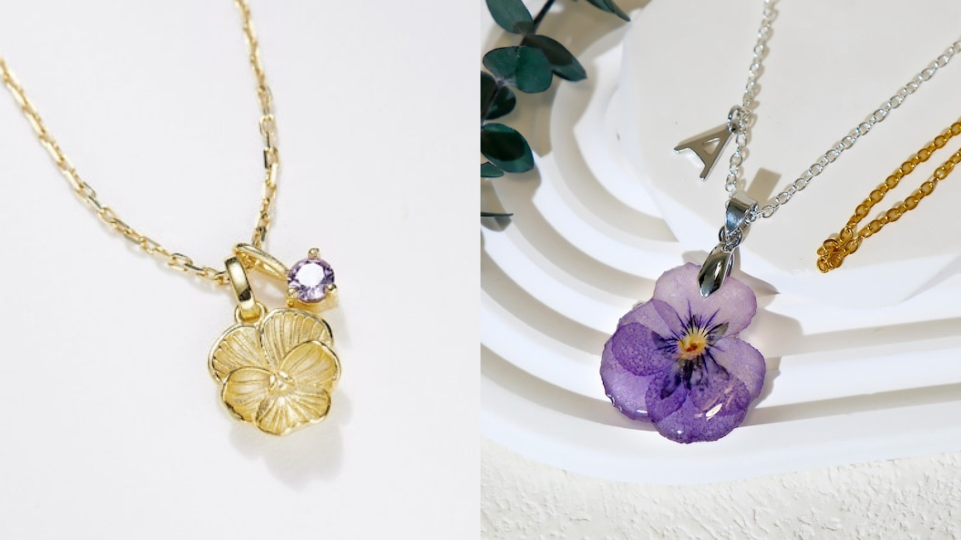 A gold violet necklace with a violet shaped charm and a violet coloured charm on the chain and a necklace of a dried violet flower sealed in resin.