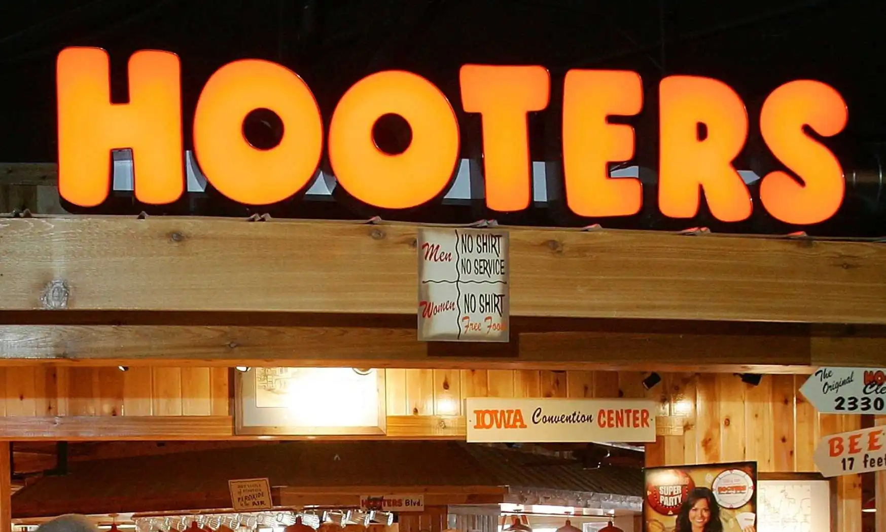 The entrance to a Hooters Restaurant.