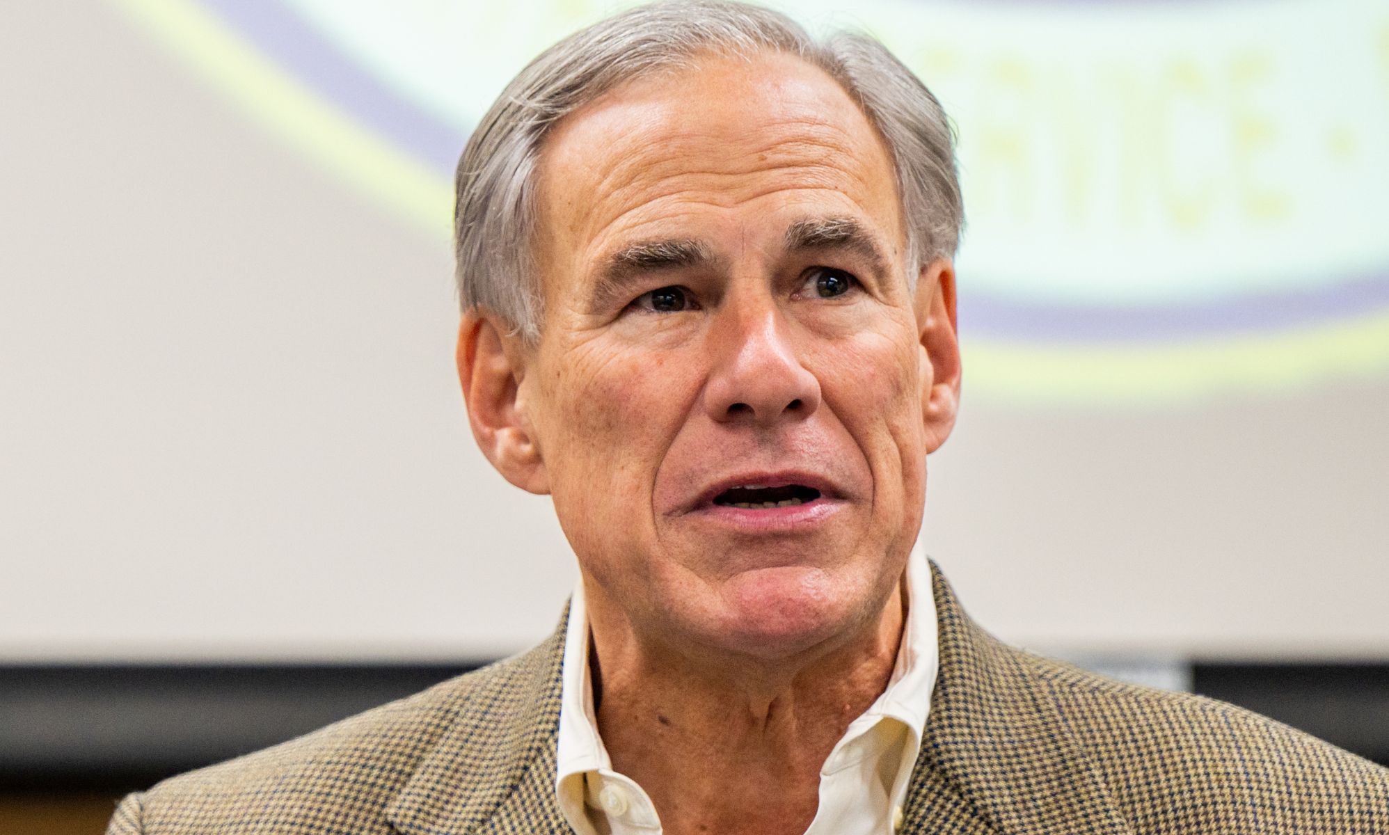 Texas governor Greg Abbott speaking during a meeting.