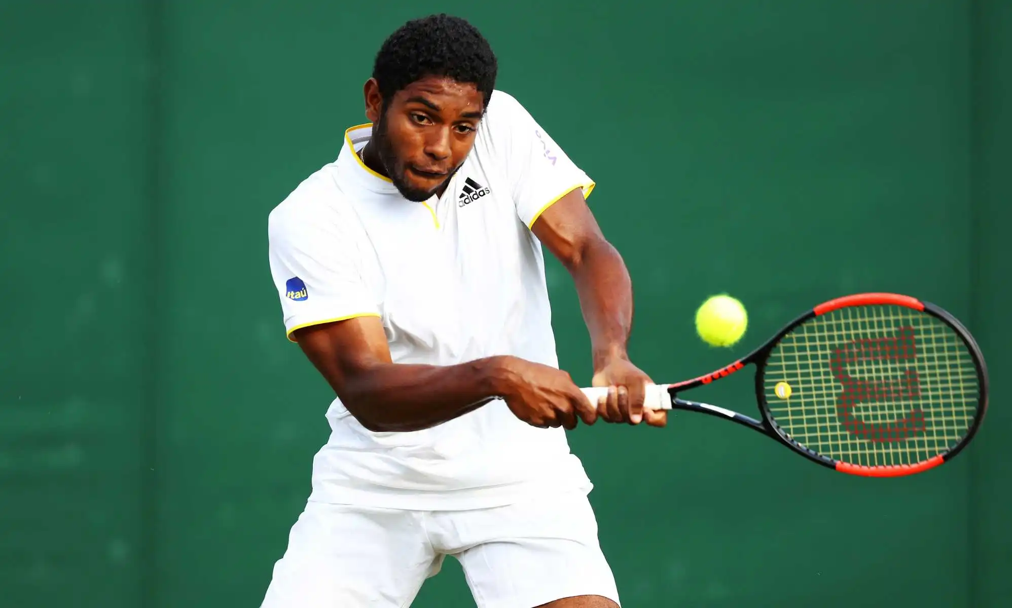 Joao Lucas Reis Da Silva of Brazil plays a backhand in his Boys