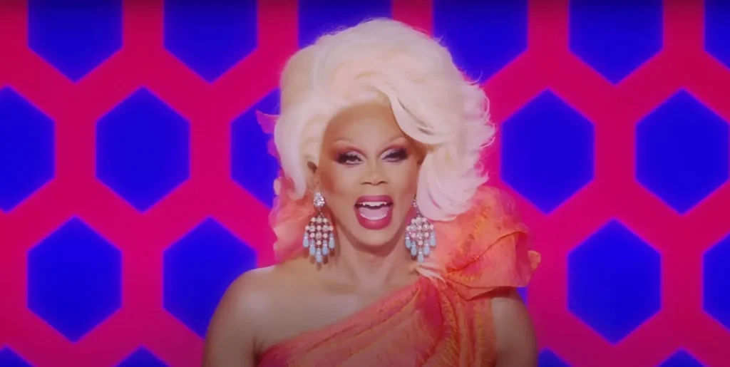 RuPaul sat behind the Drag Race judging table laughing