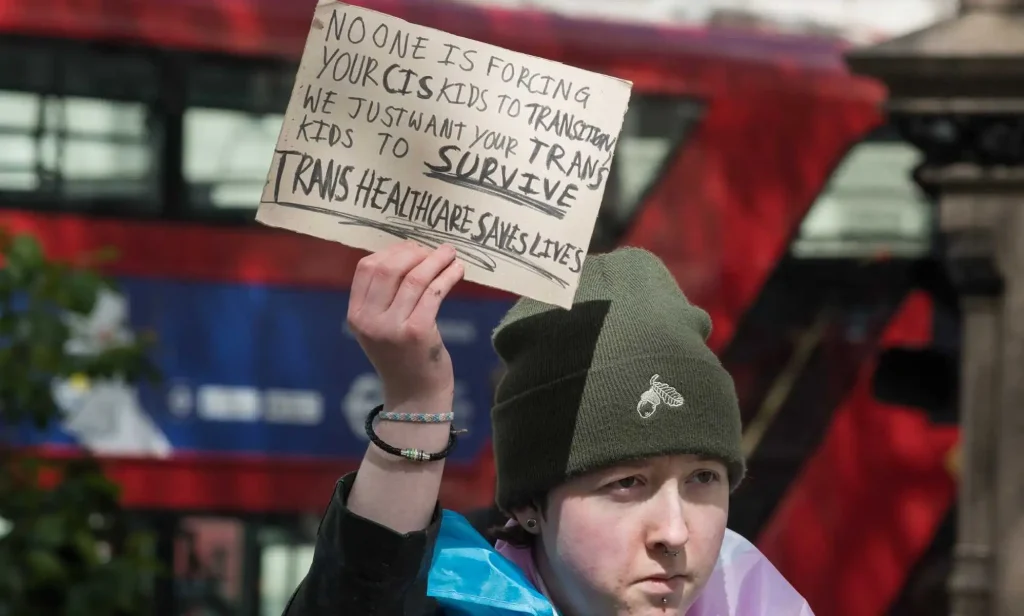 Transgender people and their supporters gather in Parliament Square ahead of a march through central London to protest against a ban on puberty blockers in London, United Kingdom on April 20, 2024.