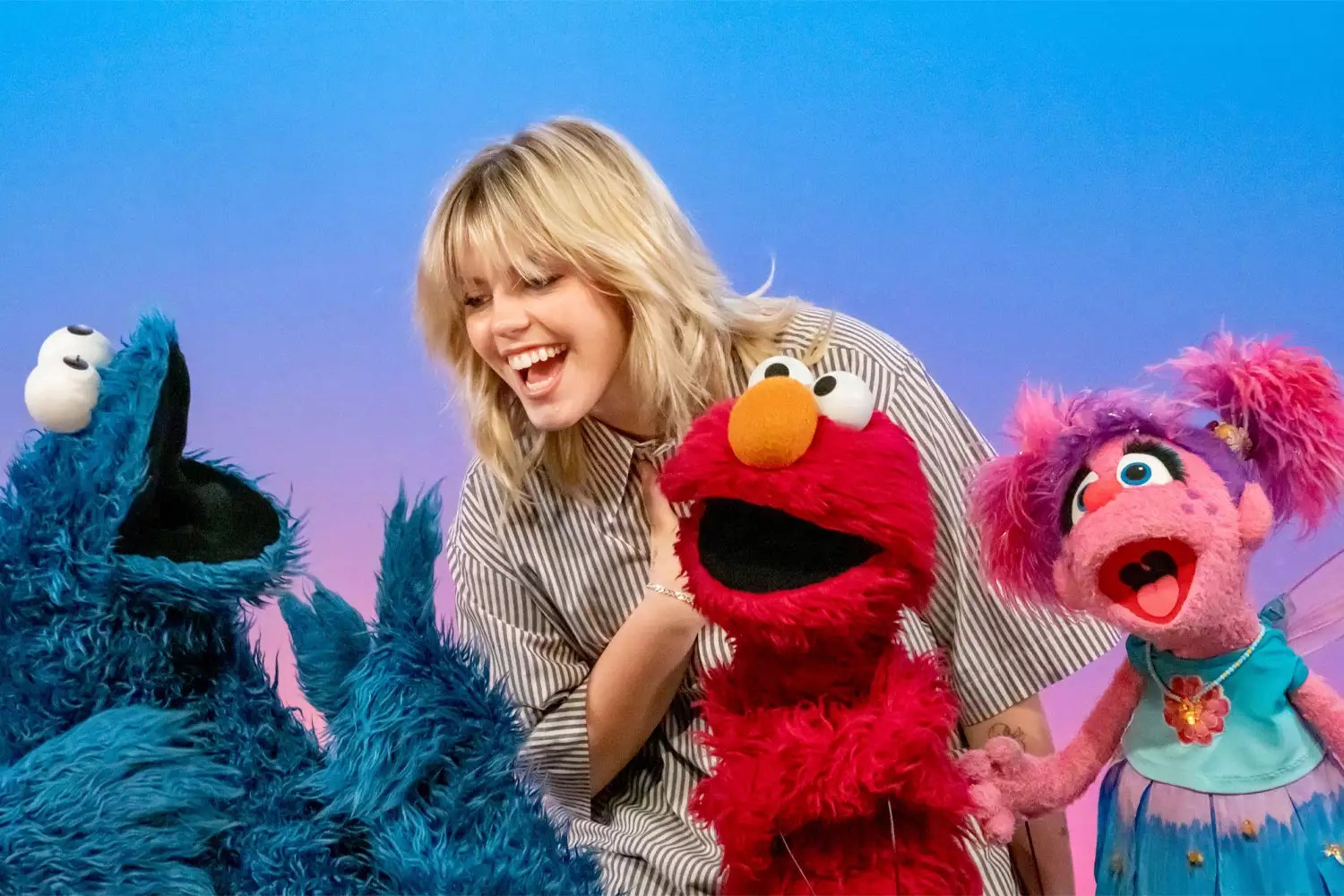 Reneé Rapp, Elmo, Cookie Monster, and Abby Cadabby in new Sesame Street trailer