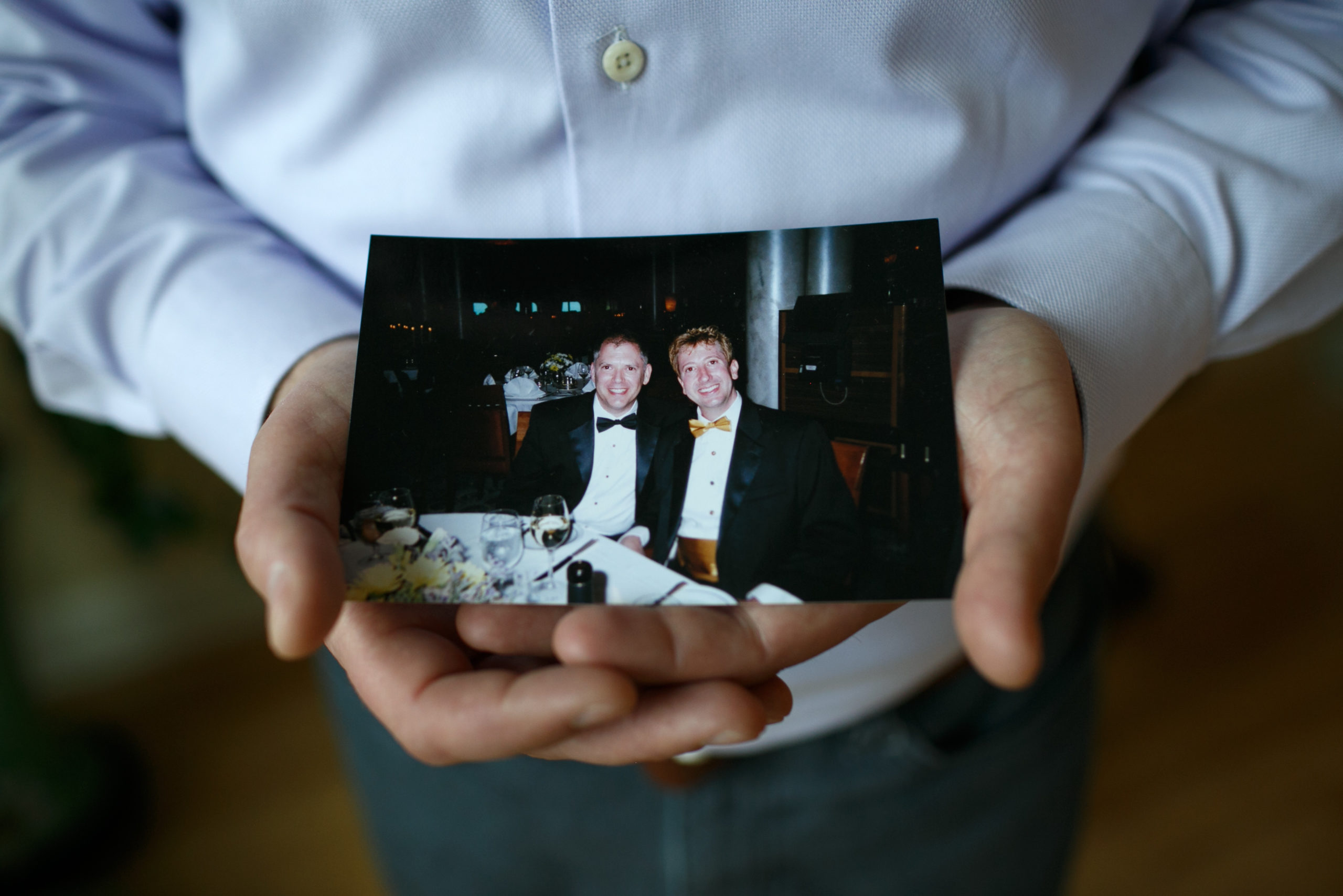 Jim Obergefell holds a photo of him and his late husband John Arthur in his condo in Cincinnati, on April 2, 2015. (Maddie McGarvey/For The Washington Post via Getty Images)