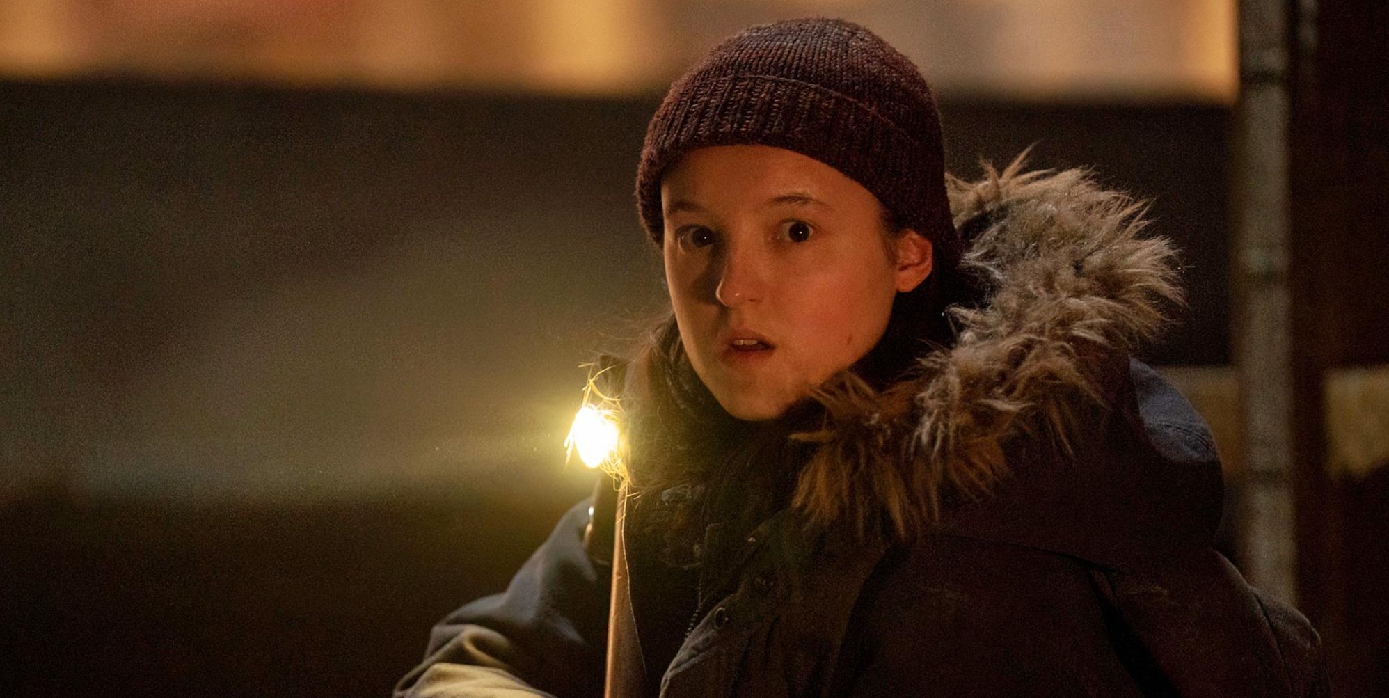 Bella Ramsey looking shocked while in character as Ellie in The Last of Us.