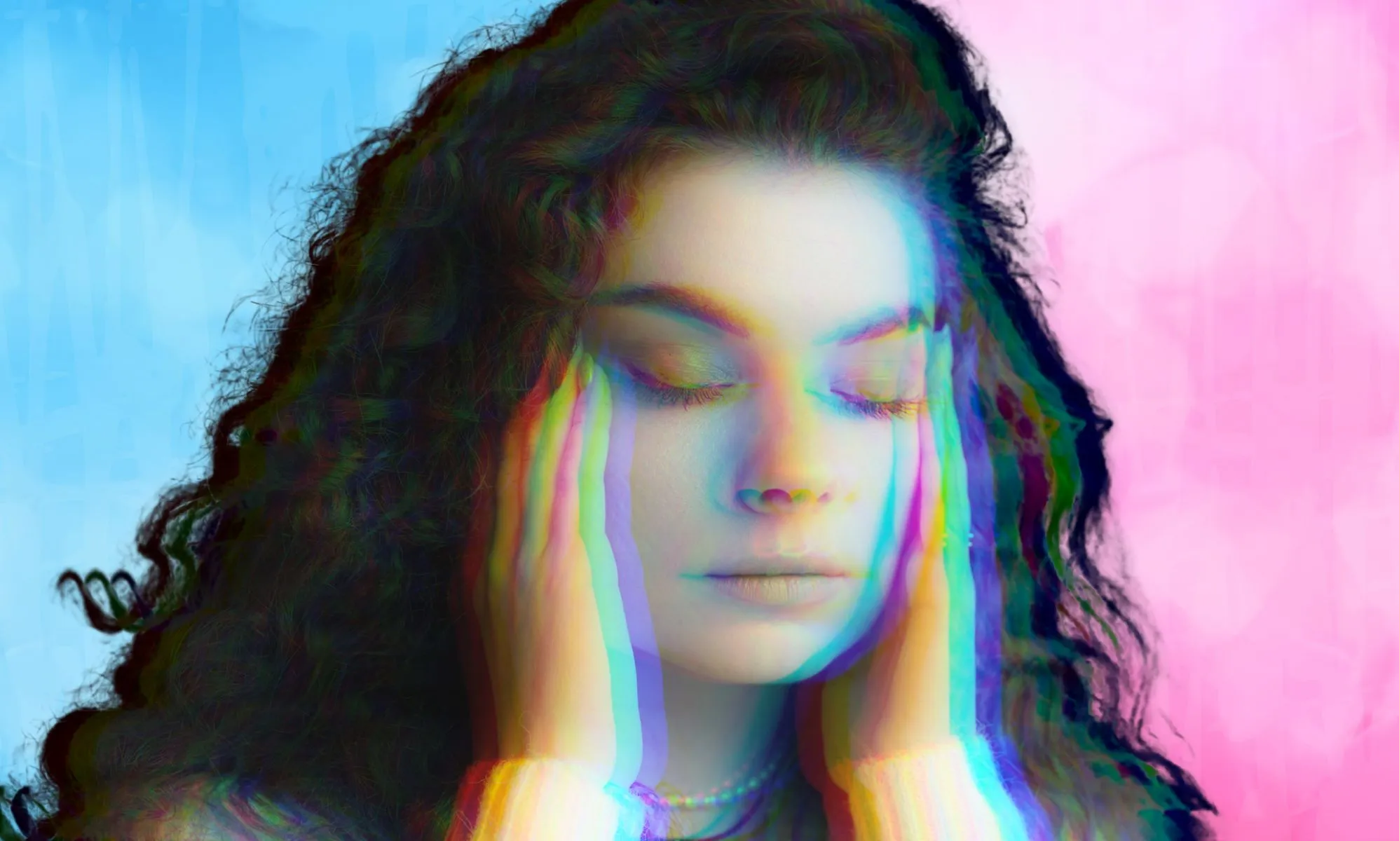 Someone rubbing their temples.