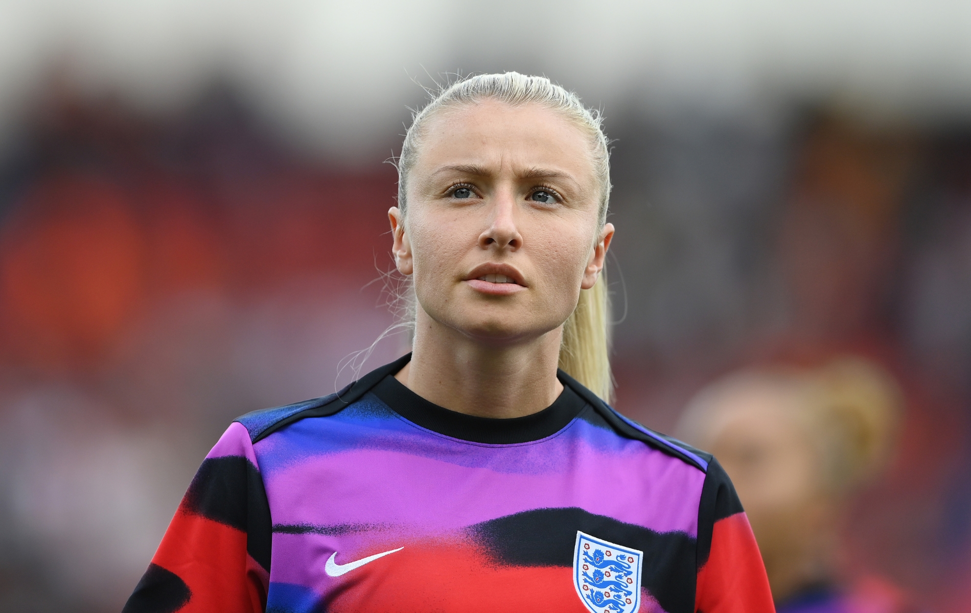 Leah Williamson of England looks on as she warms up prior to the UEFA Women