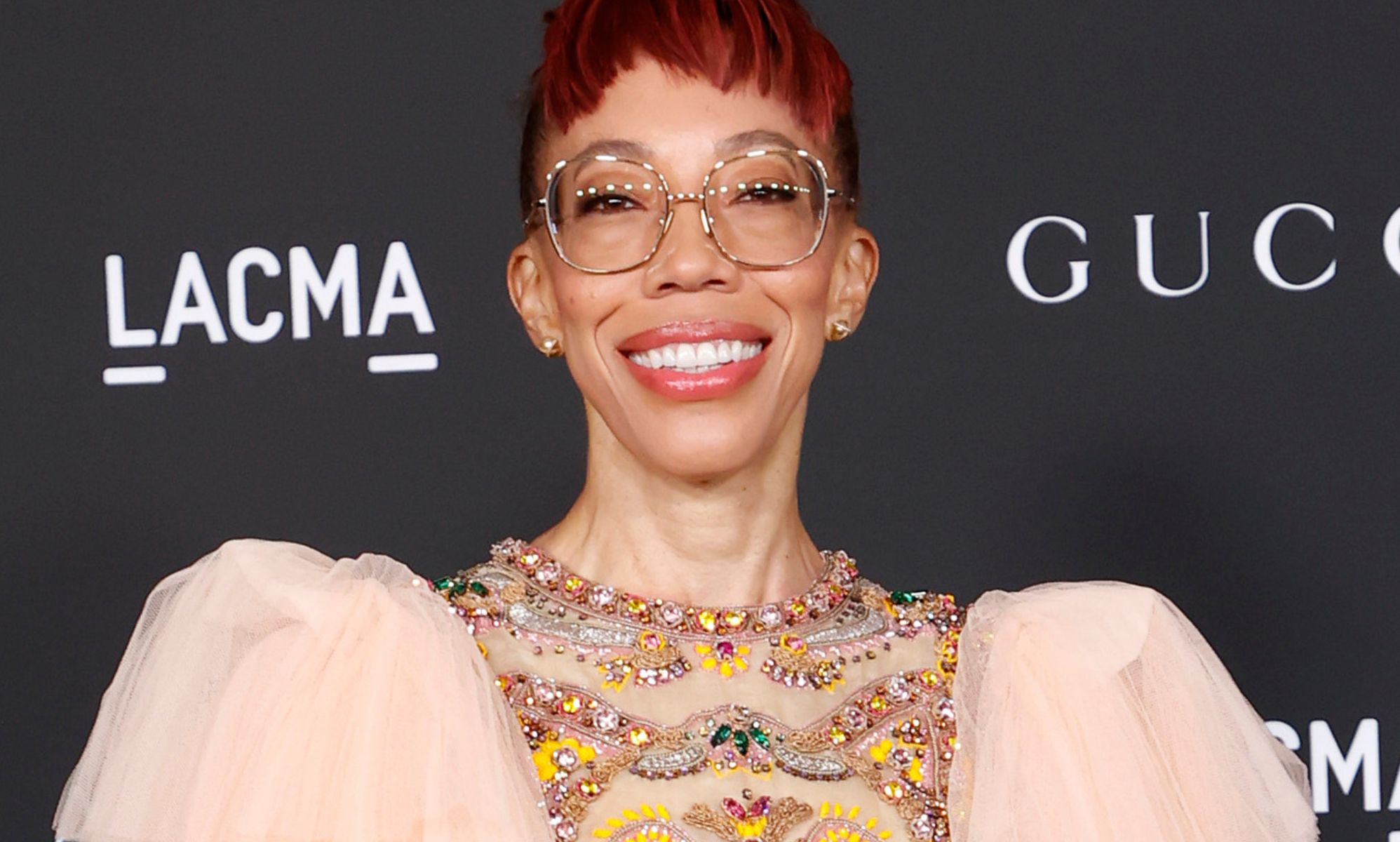Amy Sherald, pictured smiling at a red carpet show.