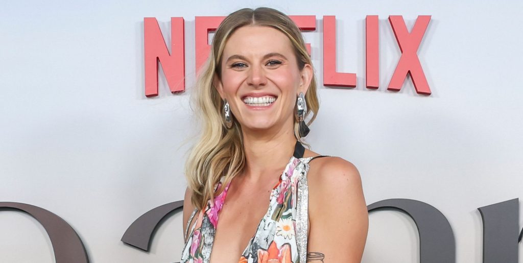 Hannah Pilkes smiles at the red carpet premiere of Netflix sitcom Leanne.