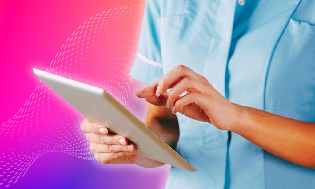 An NHS nurse on a tablet.