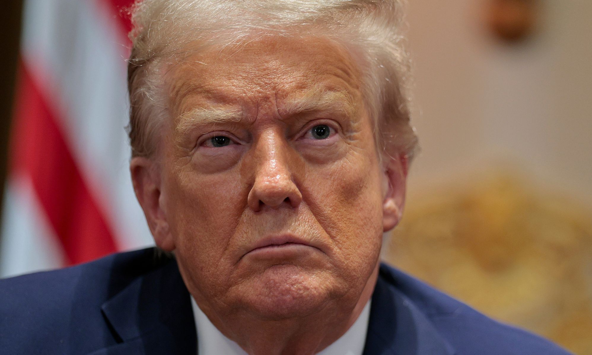 Donald Trump looking off into the distance.