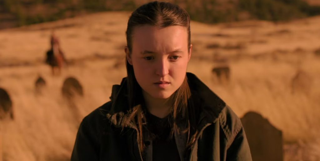Bella Ramsey as Ellie in The Last of Us season two looking downcast.