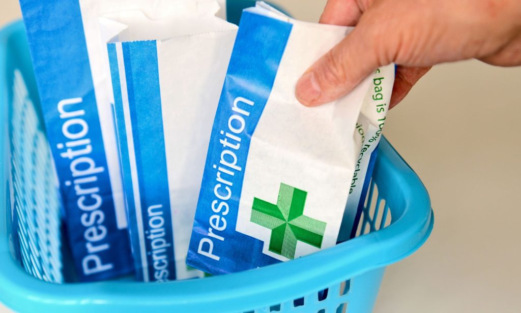 A box of prescription packets.