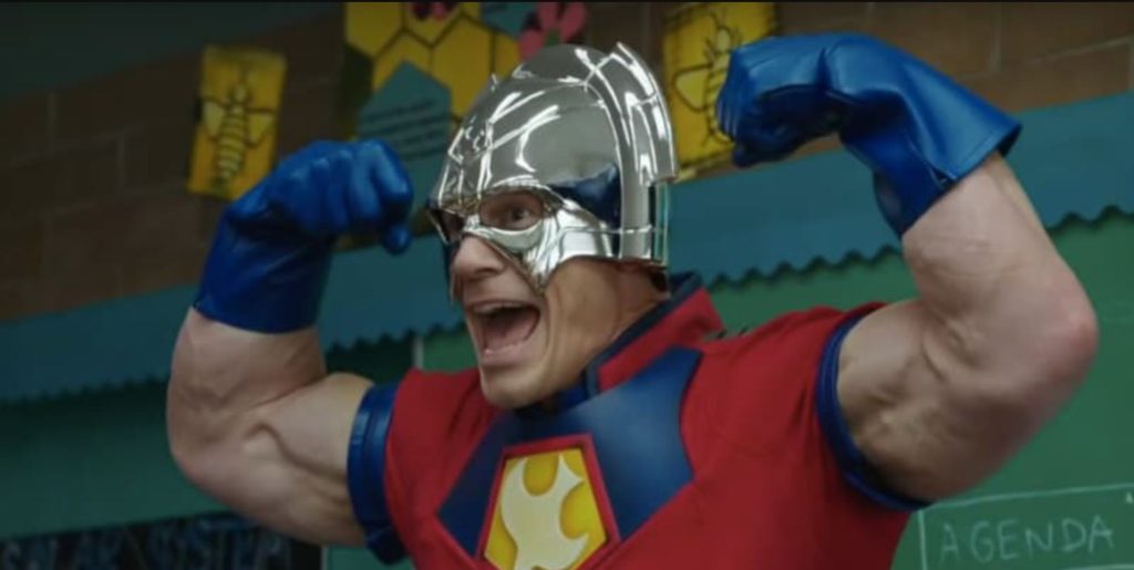 John Cena as Peacemaker flexing his muscles.