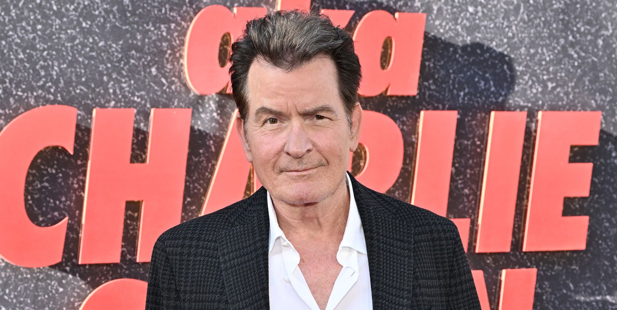 Charlie Sheen at the premiere of aka Charlie Sheen