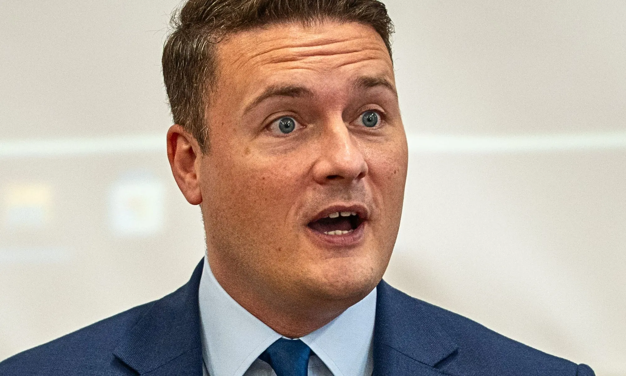 Wes Streeting pictured with his mouth open.