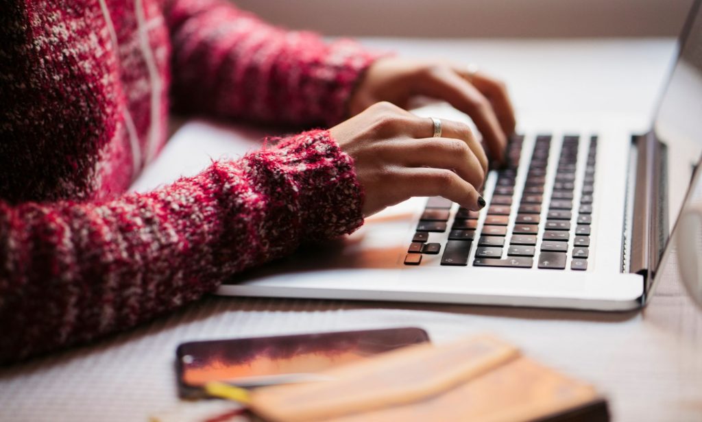 Someone typing on a keyboard.