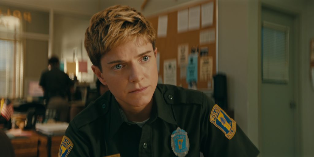 Mae Martin in a police uniform