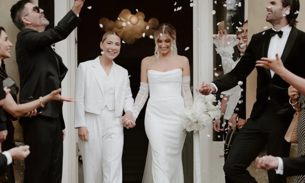 Emilia and Lucy Spraggan-Smith at their drinks reception during their wedding in 2024.