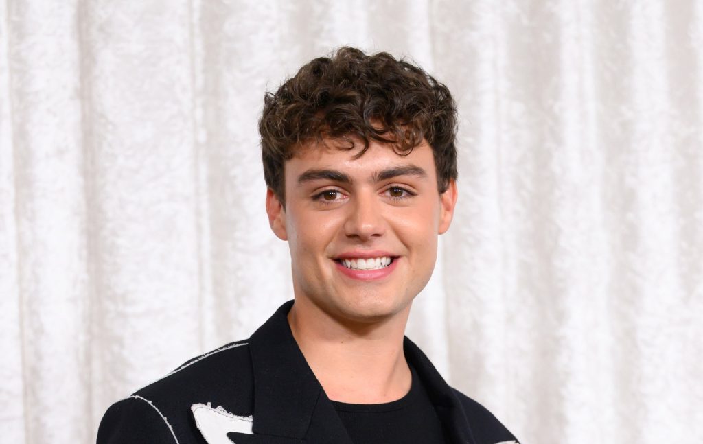 Bradley Riches smiling at the camera. He