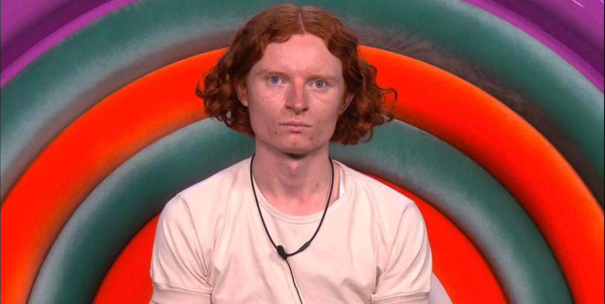 George in the Big Brother diary room looking very serious.