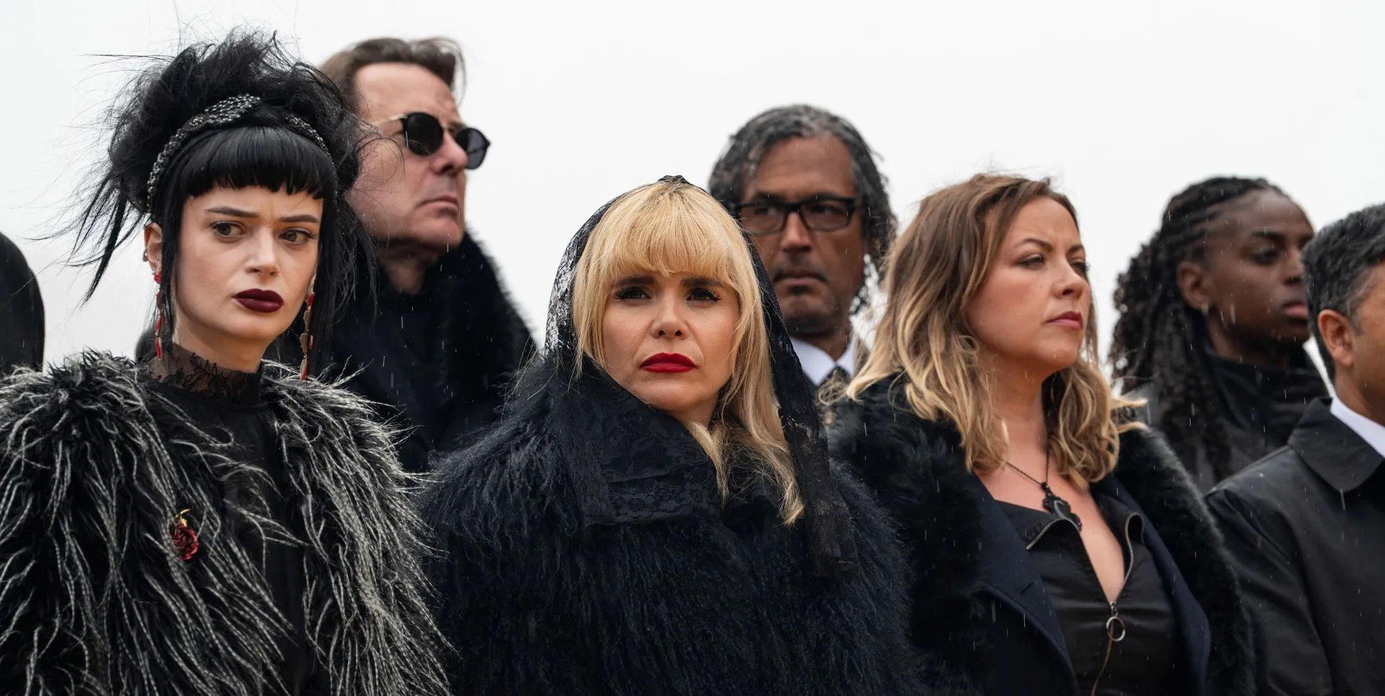 Ruth Codd, Paloma Faith and Charlott Church dressed in black and looking solemn in The Celebrity Traitors.