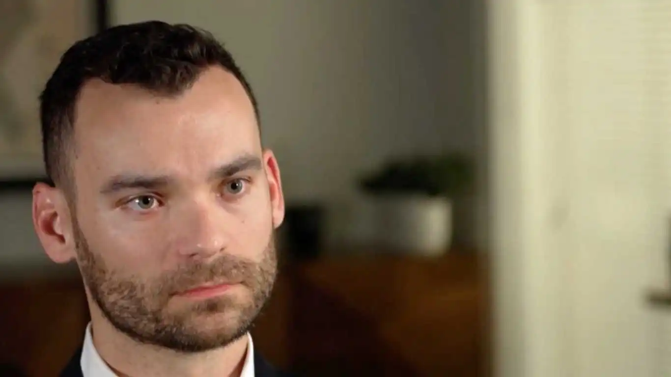 David Maltinsky has filed a lawsuit alleging that he was fired for displaying a Pride flag at his desk.