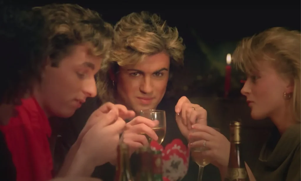George Michael in the music video for Wham! Christmas song Last Christmas.