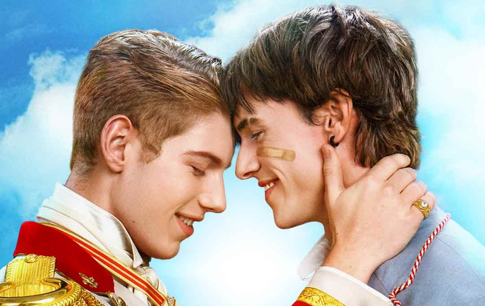 Andrew Tong as Prince Nicholas Valehart and Greg Duffy as his lover, Lucas Wilder. THe pair are resting their foreheads together while Nicholas has his hand on Lucas