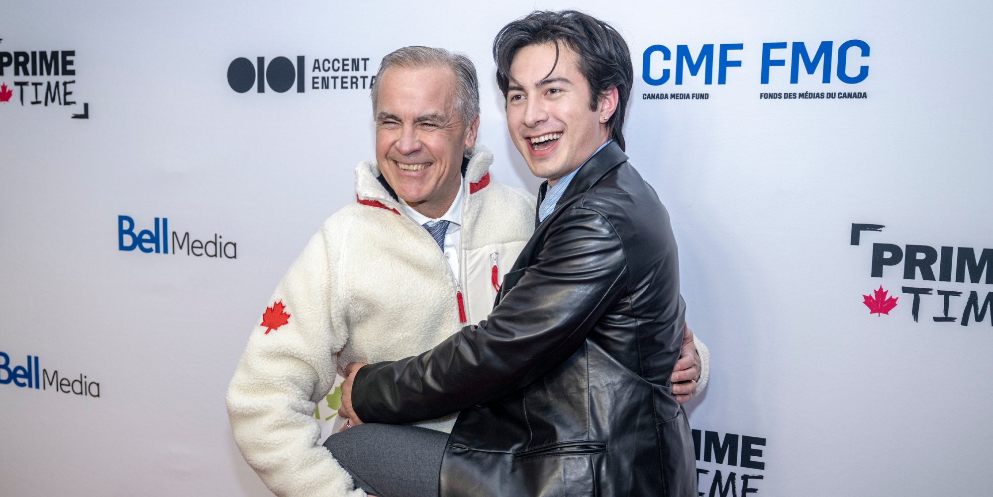 Canadian Prime Minister Mark Carney and Hudson Williams