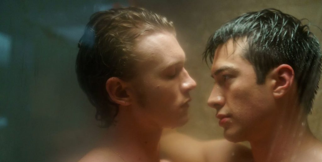 Connor Storrie and Hudson Williams embrace in a shower in Heated Rivalry.