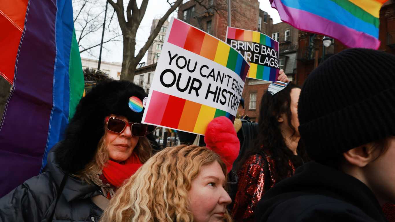 People gather in protest at the Stonewall National Monument after the Trump administration had the National Park Service remove the LGBTQ+ Pride flag from the site.