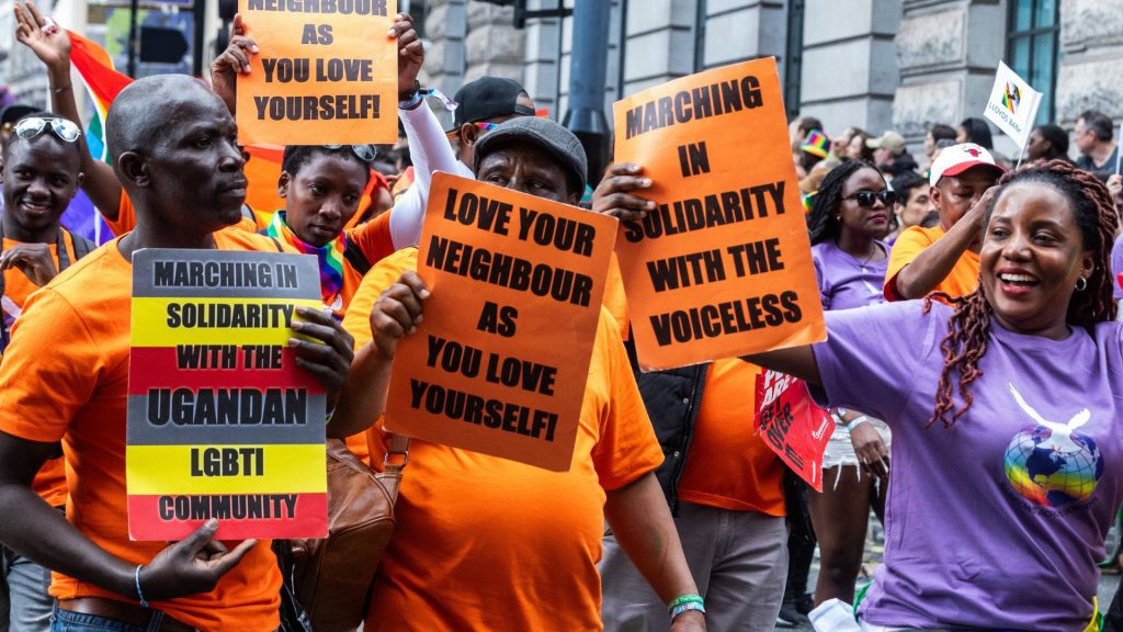 Representatives of Rainbows Across Borders protest Uganda