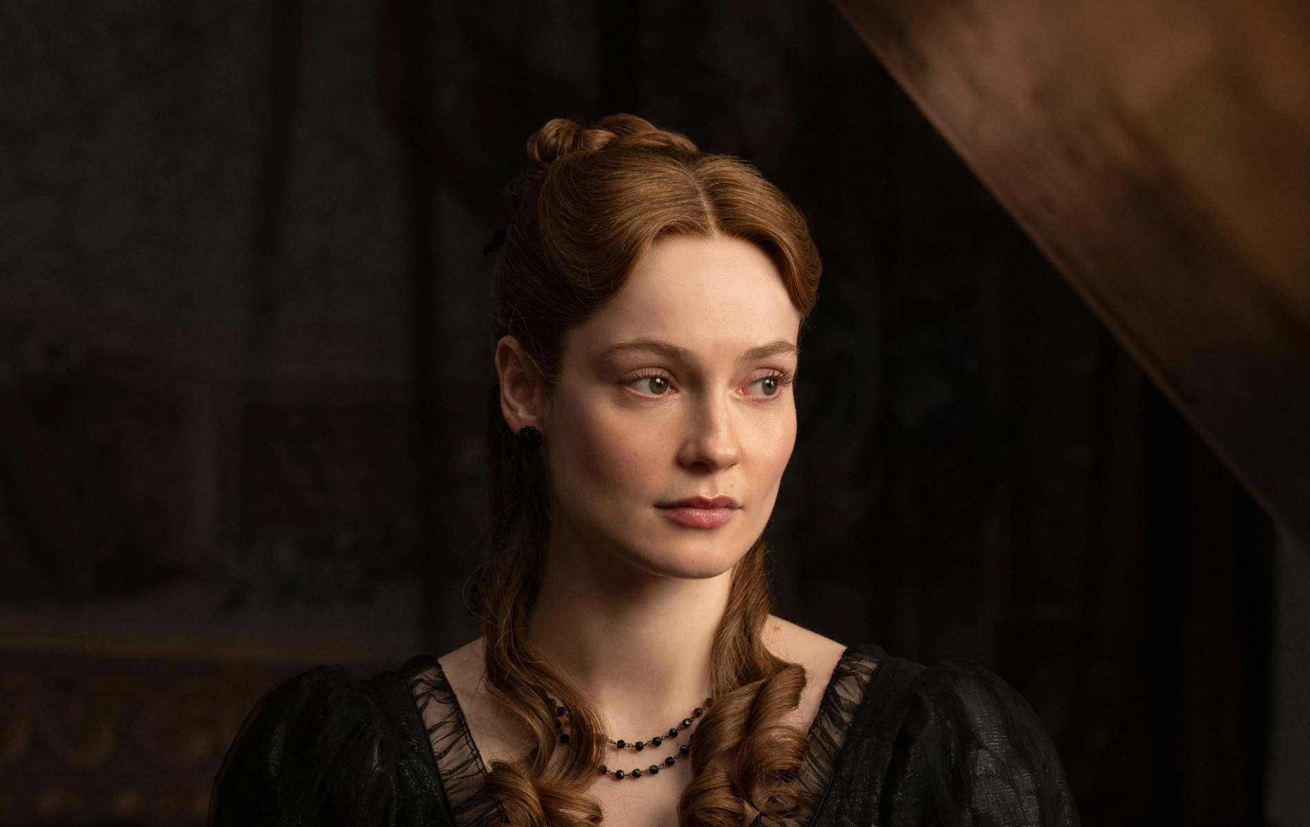 Francesca Bridgerton, portrayed by Hannah Dodd, in all black looking sad